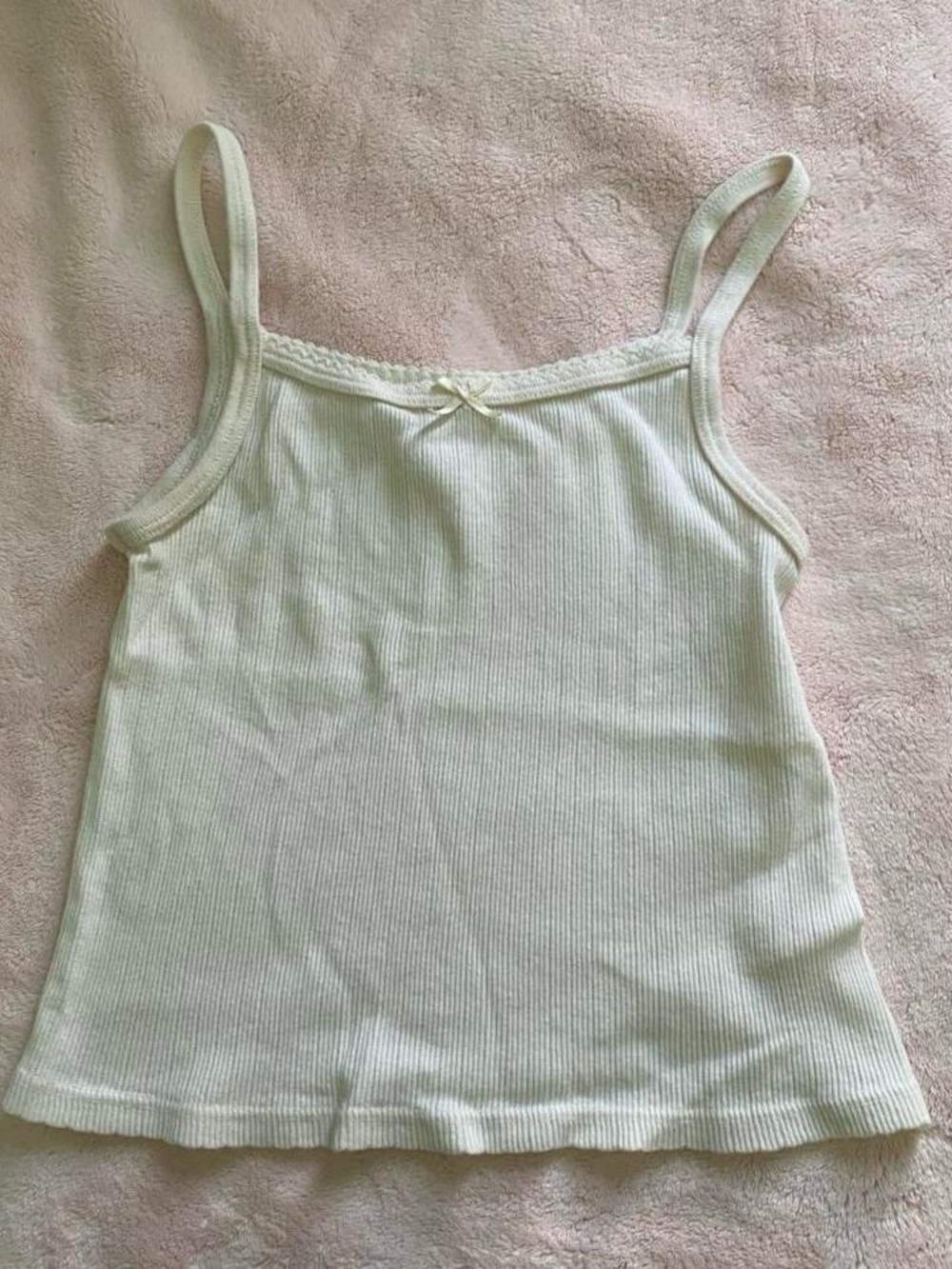 brandy melville cream/white ribbed tank top with a bow detail